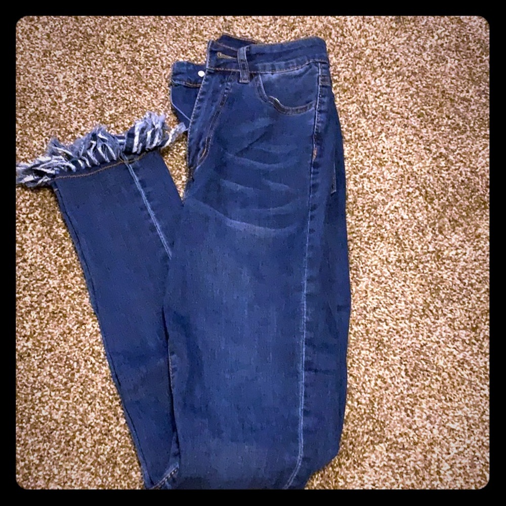 Jeans with fraded bottoms